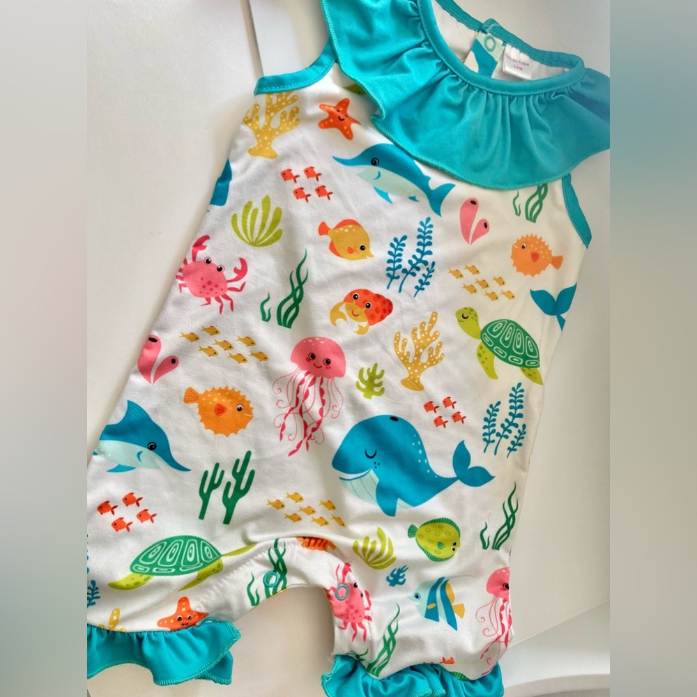 Penelope Plum Romper like New. Size 12 month but stretchy.